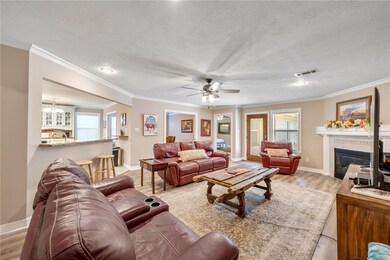 Open concept living room with direct access to eat