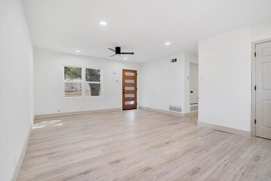 Spare room with light wood-style floors, recessed 