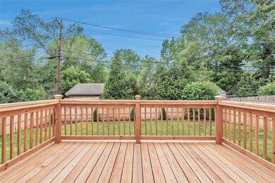 New privacy fence encloses the full back yard,