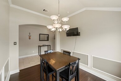 The second room on your left is this cozy formal d