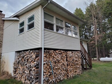 REAR OF HOUSE LOOKING EAST