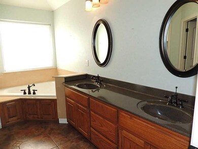 Master Bath/Spa. Master Bath has a corner Jacuzzi