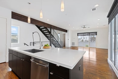 Exposed beam and steel staircase impress architect