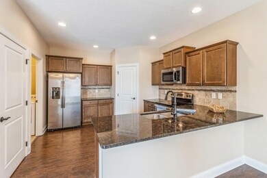 Large Kitchen with bar area and plenty of Cabinets
