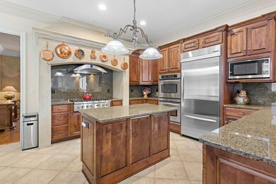 Kitchen with granite countertops, modern appliance