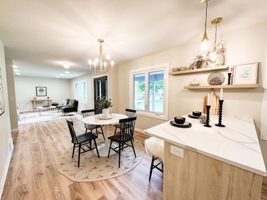 Gorgeous LVP flooring throughout main floor rooms.