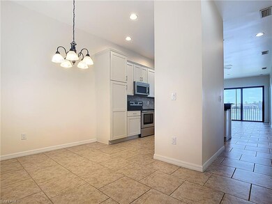 Kitchen with recessed lighting, stainless steel ap