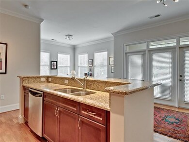 open kitchen w/ granite countertops.