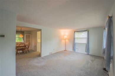 Living Room opens up to spacious Dining Room