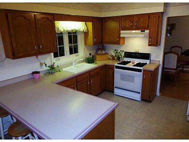 Kitchen. 11 X11  Kitchen. Beige with brown speck W