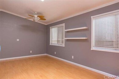 Light and airy great room opens to the kitchen.