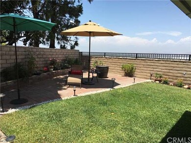 The backyard has several patios to enjoy.