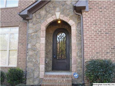 3 car garage and level backyard. 2 lots!