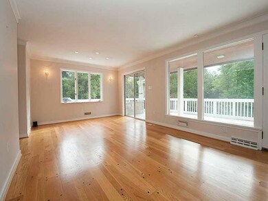 Living room Dining room combo with door leading to