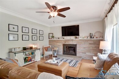 Beautiful stone fireplace and hardwood floors