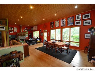 Dining Room. Expansive open concept with 12  ceili