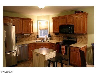 Kitchen - Stainless Appliances, Corner Sink and Corian Style Countertop, Nice Cabinets
