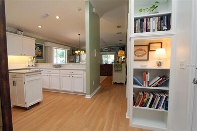 Front Hall looking toward Rear of Home, Note Volume Ceilings and Laminate Floors