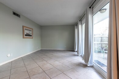 Looking from the dining room into the living room
