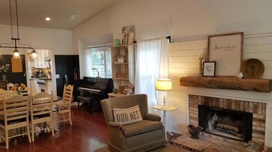 Living Room Towards Dining & Kitchen