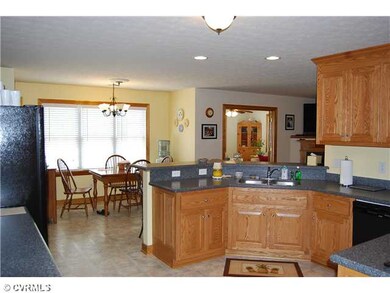 Kitchen - CUSTOM OAK CABINETS AND HARD SURFACE COU