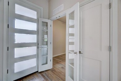Entrance foyer featuring light hardwood / wood-sty