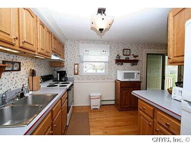 Kitchen. Oak hardwood floors, newer dishwasher, up
