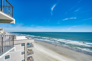 Property view of water featuring a north facing beach view