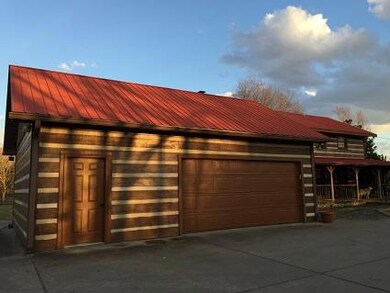 The Over-sized 2 Car Garage Has Rear Entry 