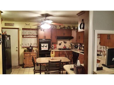 Kitchen opens to dining area and living room