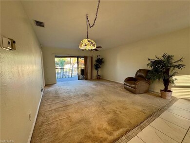 Unfurnished room with carpet flooring