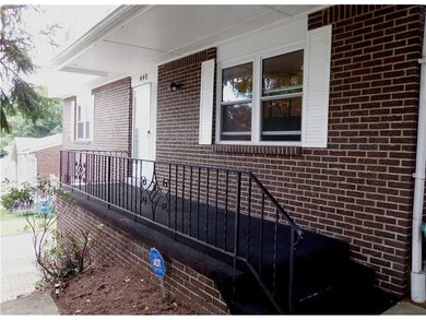 Facade/Exterior Front. Nice covered porch...