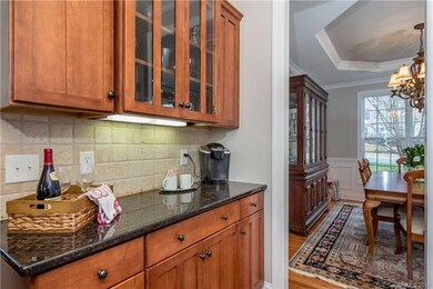 Spacious Butler's Pantry with granite & tumbled ti