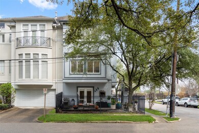 Wrap around gated patio with beautiful live oak tr