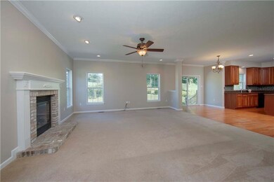 Family room with gas log fireplace...