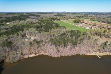 7.41 acres of waterfront lot, boats, fishing and m