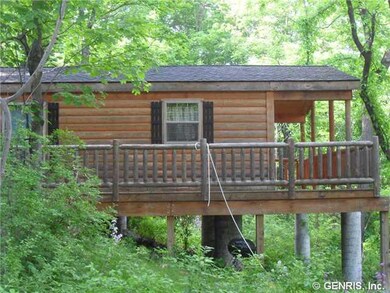 Exterior Front. Side view of cabin.