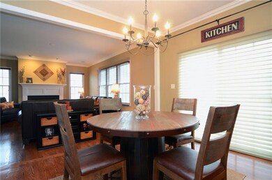 The breakfast area includes custom lighting and a 