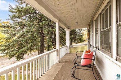 Balcony featuring covered porch