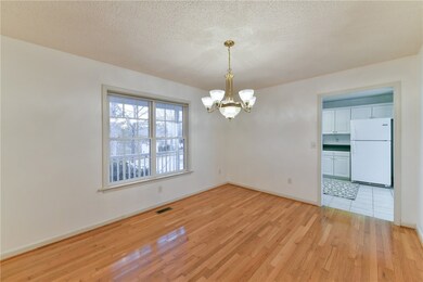Dining room at entry and next to kitchen.