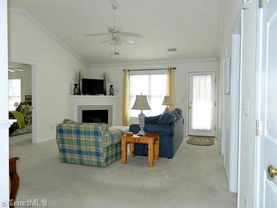 Living Room. Vaulted ceilings, hall closet, gas fireplace and ample space!