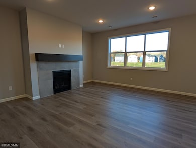 Charming fireplace, perfect for hosting gatherings and keeping cozy during the chilly winter months.