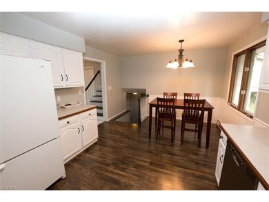 Dinette area within kitchen. You can see access to