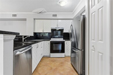 1721 Village Blvd unit 104, West Palm Beach, FL 33409 - photo 2