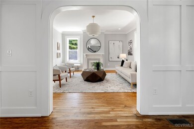 Arched doorway, lovely hardwood floors
