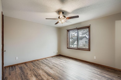 10930 Sumter Ave N - Web Quality - 017 - 16 2nd Floor Primary Bedroom.jpg