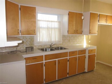 kitchen offers many cabinets