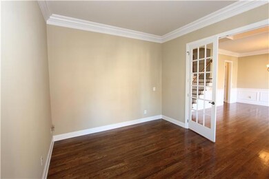 This is the perfect study!  There is a great view from the front of the home.  The glass french doors keeps this room bright but private. 