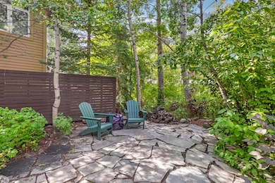 Fire pit area nestled among trees