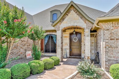 Amazing landscaping along the front of the home